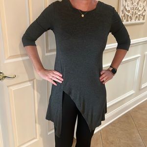 Gray asymmetric top with a slit.